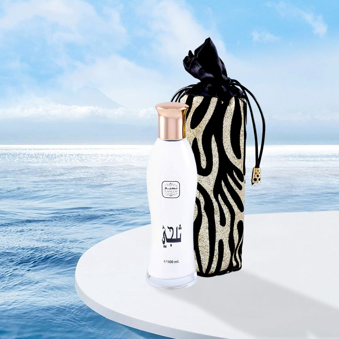 Perfume bottle with a zebra-patterned bag against a blue sky and water background