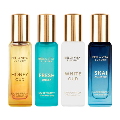 Four Bella Vita Luxury perfume bottles in different colors on a white background